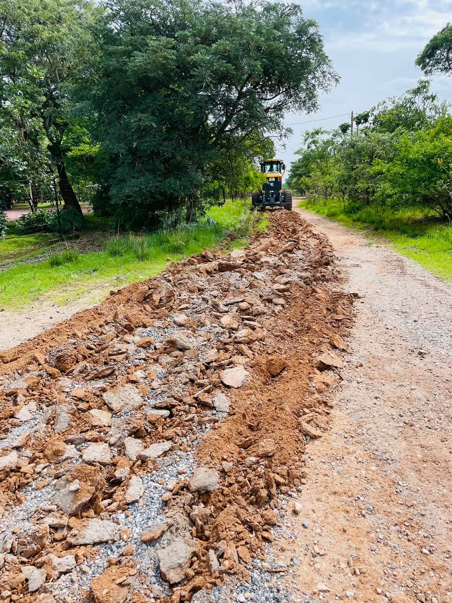 BMR grader working along a rocky track